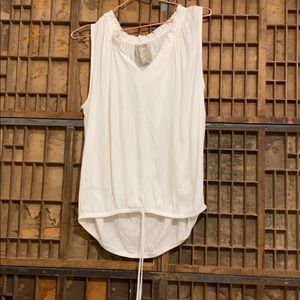 Ruffle open neck sleeveless blouse